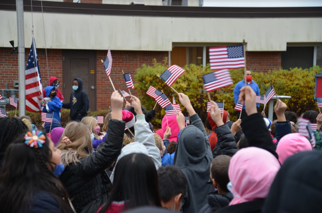 Students honoring Veterans Day at Hamilton Elementary